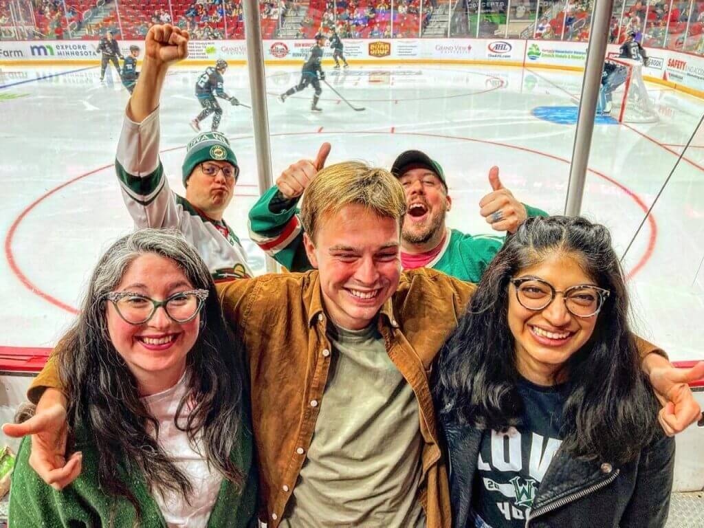 MoDA staf and interns at an Iowa Wild hockey game in Des Moines, Iowa.