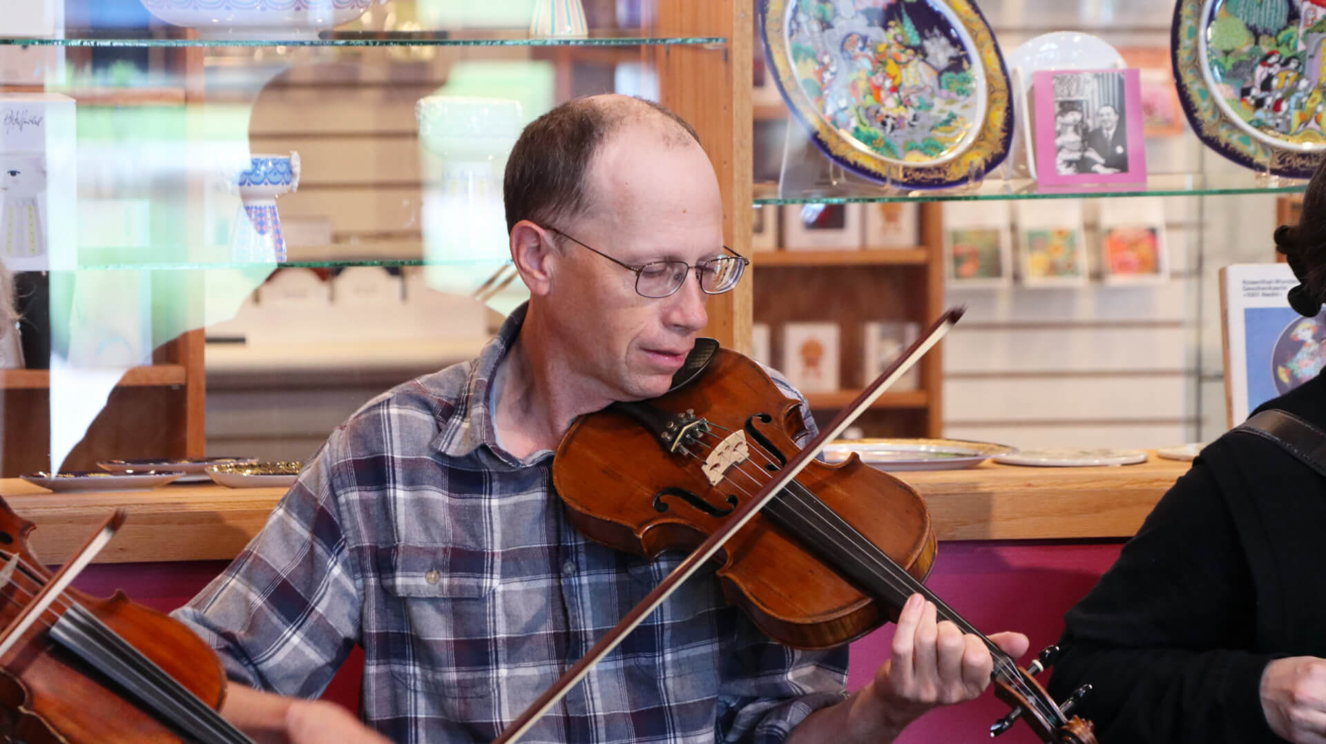 Nate Kemperman fiddling.