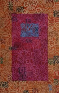 Painting with an orange border, the middle has a red rectangle with a blue rectangle at the top portion, the rectangles and border have an aray of items painted, vases, flowers, birds, all are a nuance of orange, red, or blue.