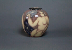 A vase with a nude woman as the motif