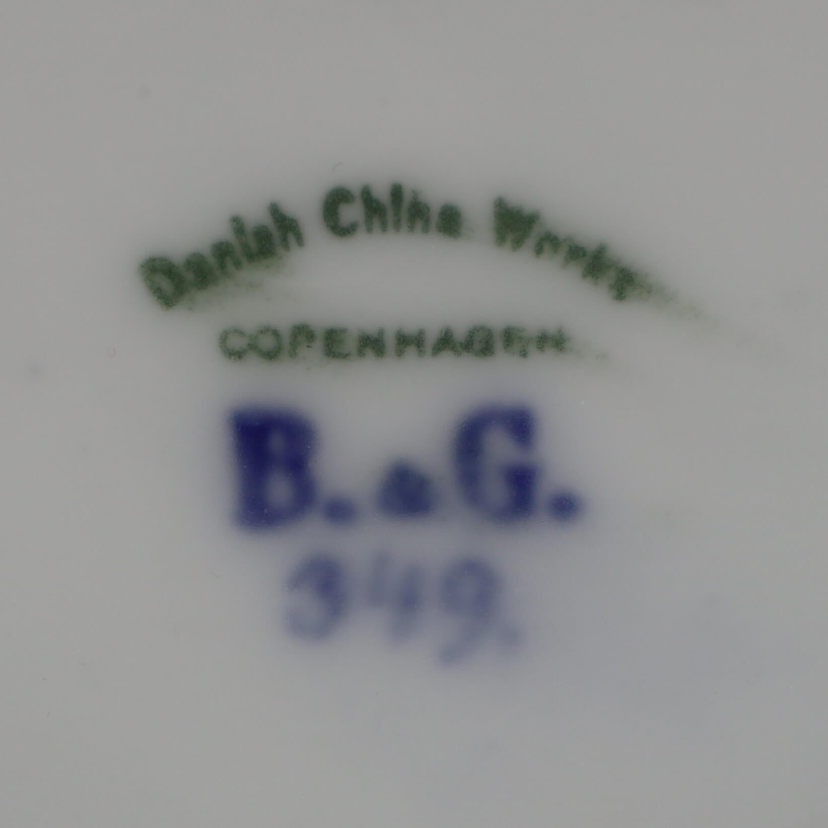 Close up of the manufacturer's stamp, reading "Danish China Works. Copenhagen. B. & G. 349"