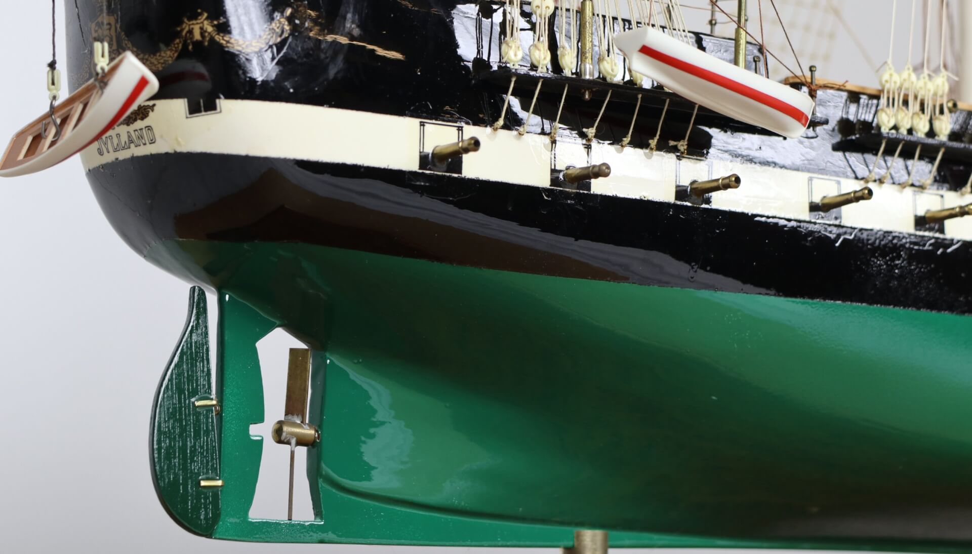 Rudder of a model ship with propeller at the rudder.