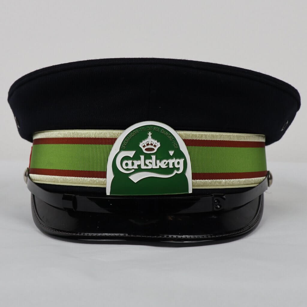 Black cap with a white, red, and green band featuring the Carlsberg logo.