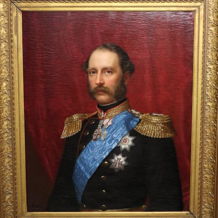 Portrait of a man in military uniform with gold epaulettes, a blue sash, and medals, set against a deep red backdrop within a gold frame.